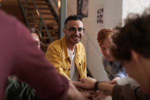 man meeting with group of students