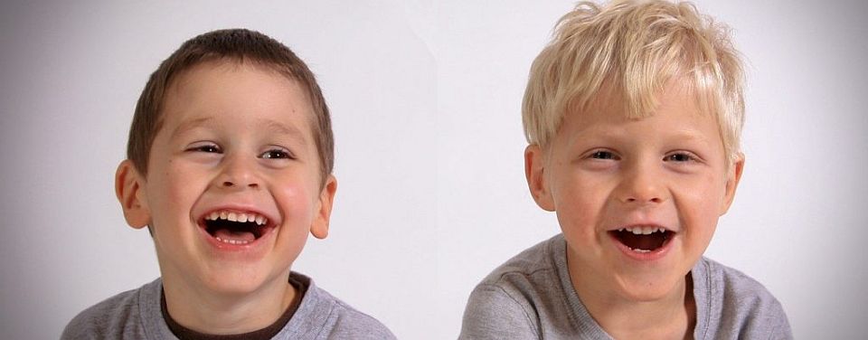 two young boys laughing