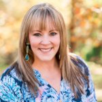 Dr. Cathy McKay smiles at the camera for a headshot.