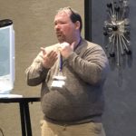 Dr. David Smith signing to partcipants