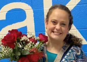 Elizabeth Evans holding flowers