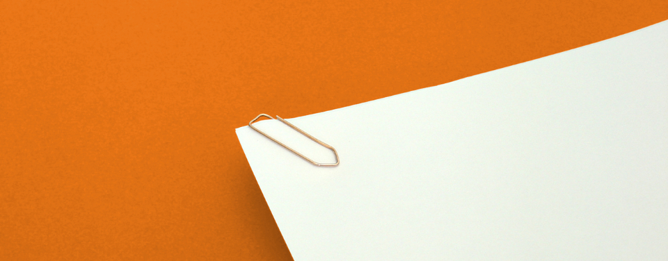 blank white pages on orange background