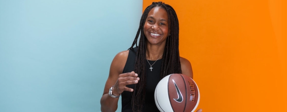 Tamika Catchings Holding Basketball