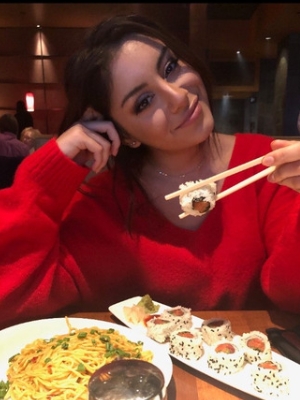 Taylor Gonzalez eating sushi